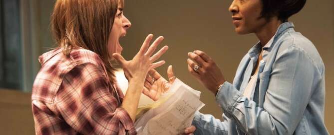 actresses on stage in a play