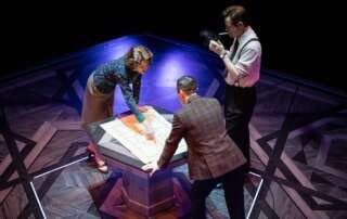 03 Carolyn Holding Geoffrey Kent and Aaron Blakely. Photo by Jamie Kraus Photography