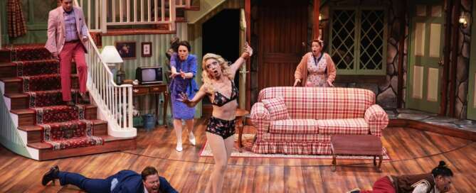 actors on stage in a comedy