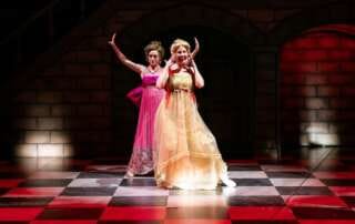 actors on stage in a play