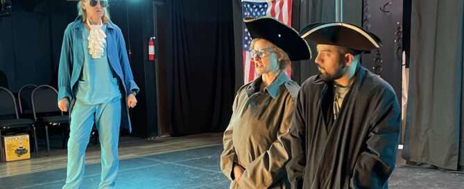 actors on stage in a comedy