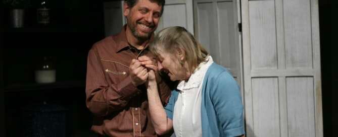 actors on stage in a play