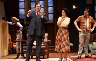 actors on stage in a murder mystery