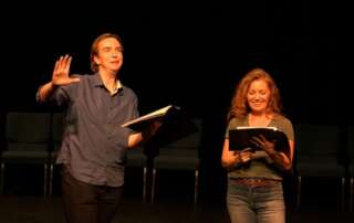 actors onstage in a play