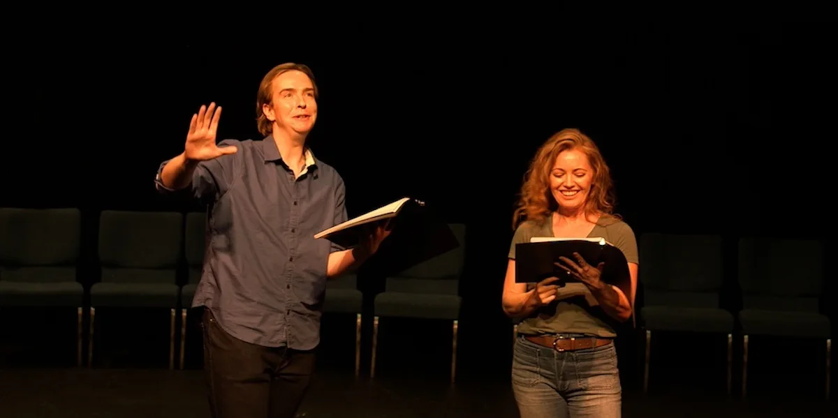 ‘The Critic’ weighs in with a solid cast, uneven script 1 actors onstage in a play