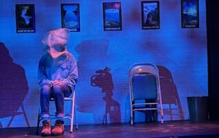 actor onstage in a play