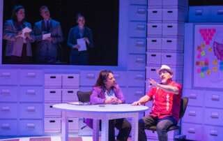 actors onstage in a play