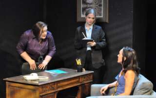 actors onstage in a play