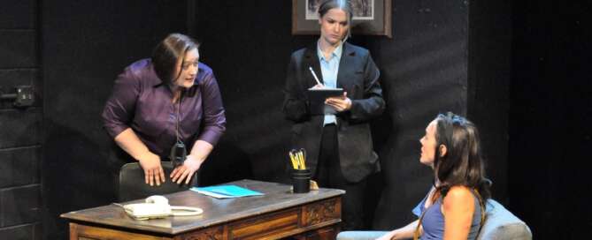 actors onstage in a play