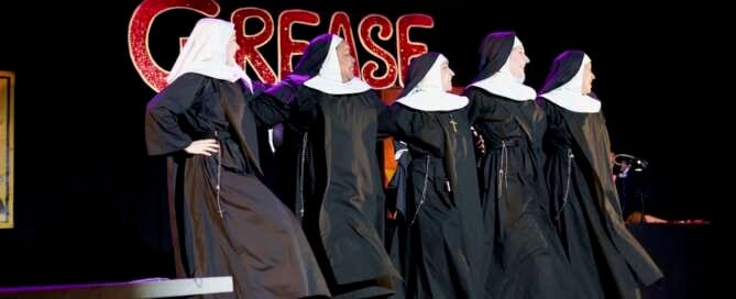 actors onstage in a play