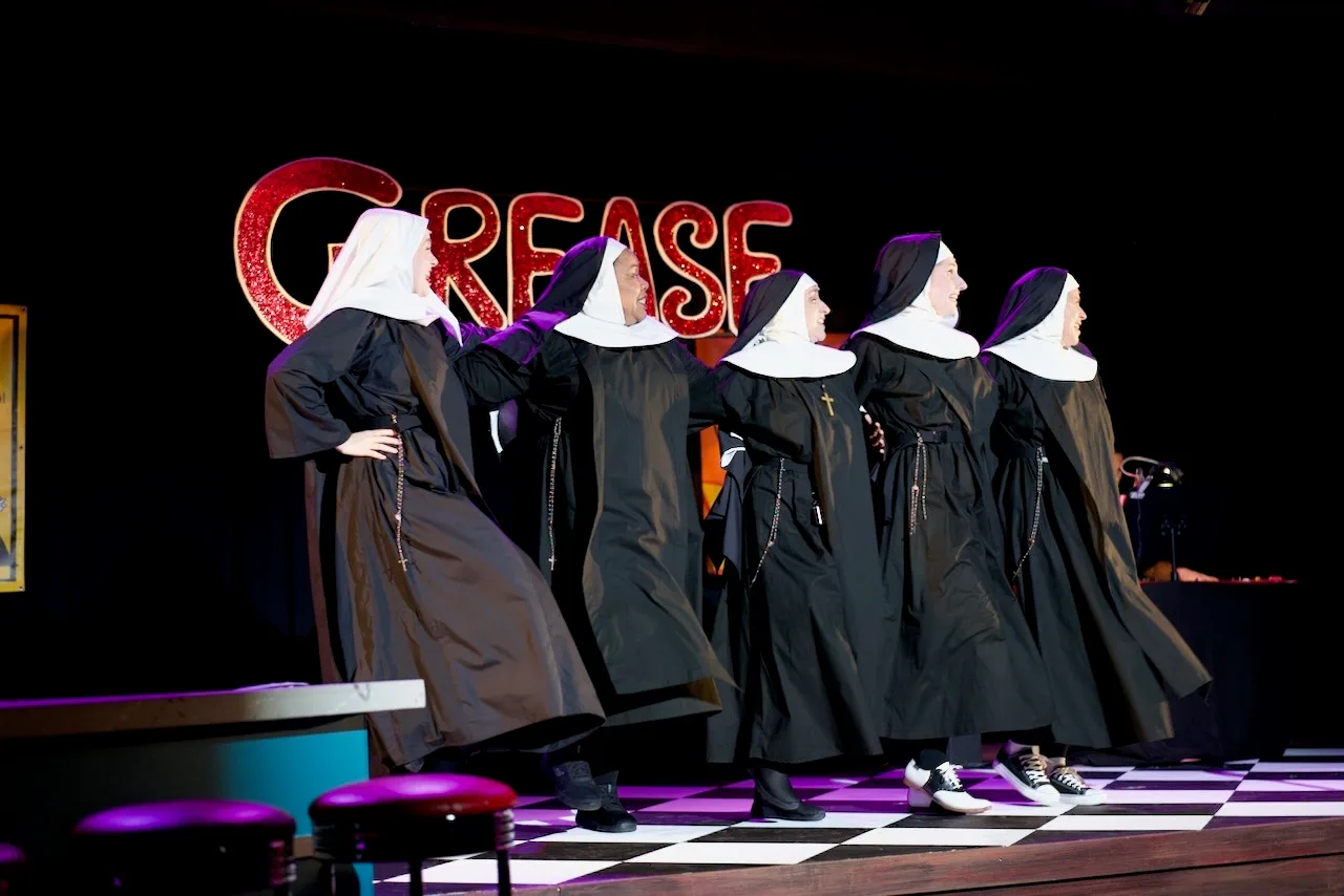 actors onstage in a play