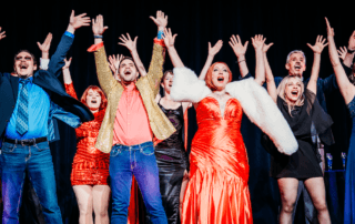 actors onstage in a play