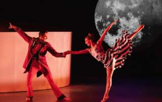 dancers on stage in a ballet