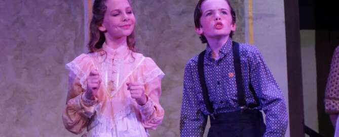 actors onstage in a play