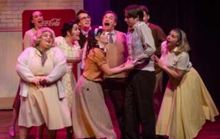 actors onstage in a play