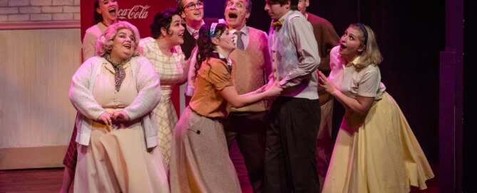 actors onstage in a play