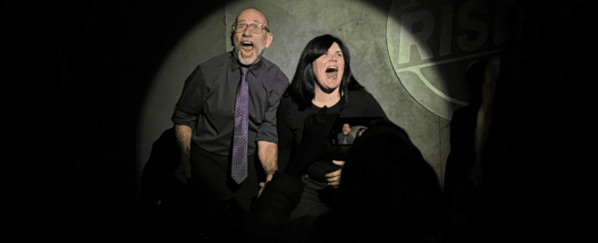 actors onstage in a comedy show