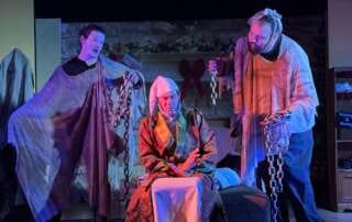 actors onstage in a play