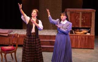 actors onstage in a play