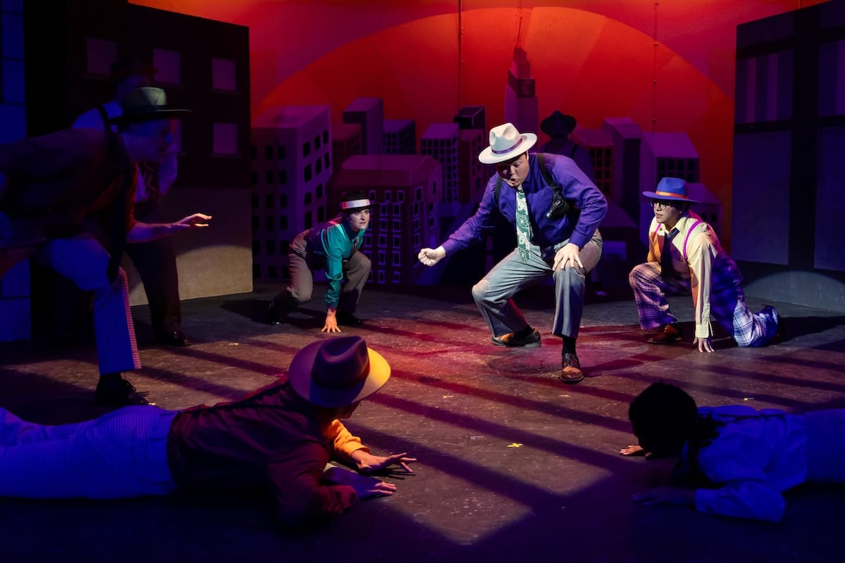 actors onstage in a play