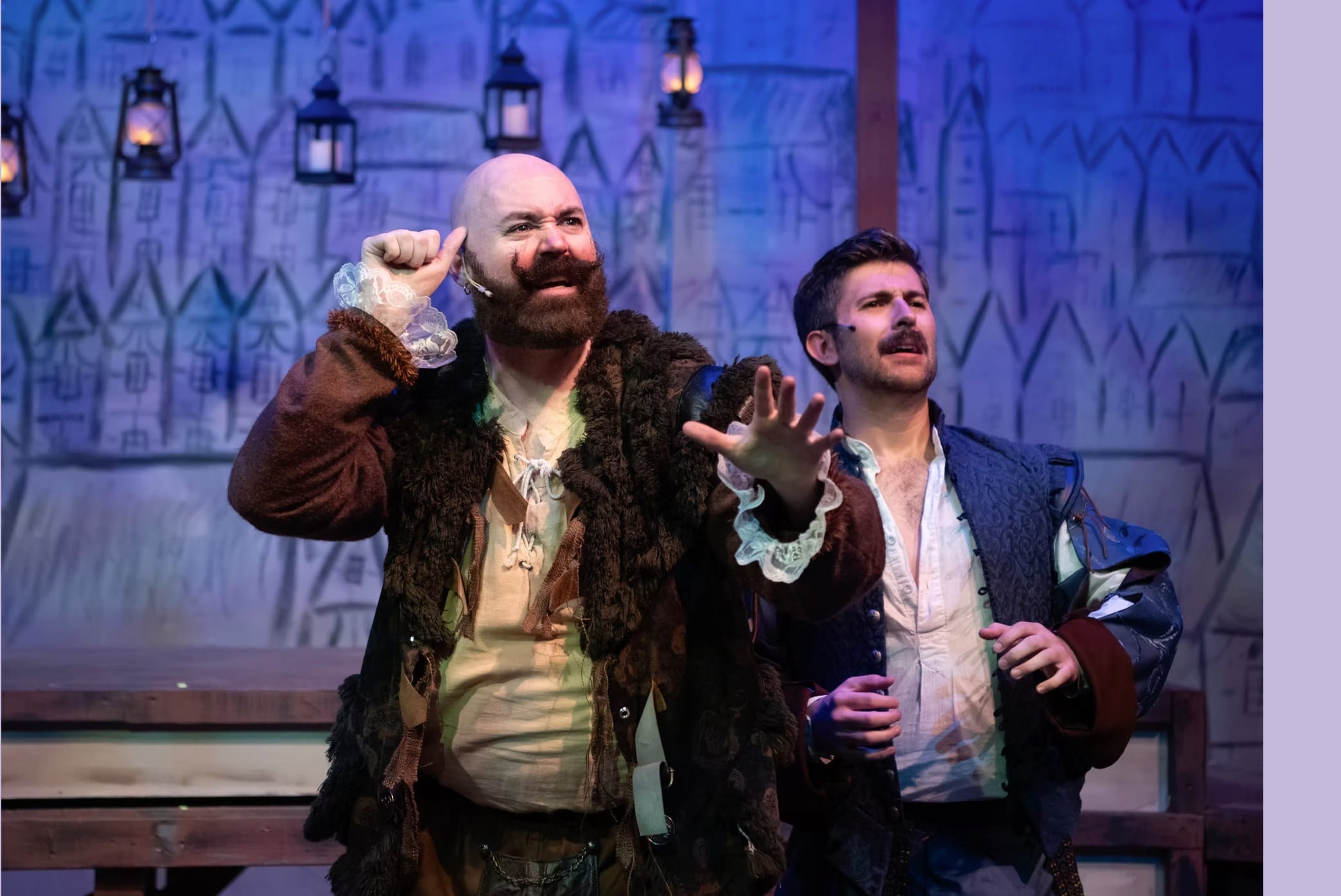 actors onstage in a musical