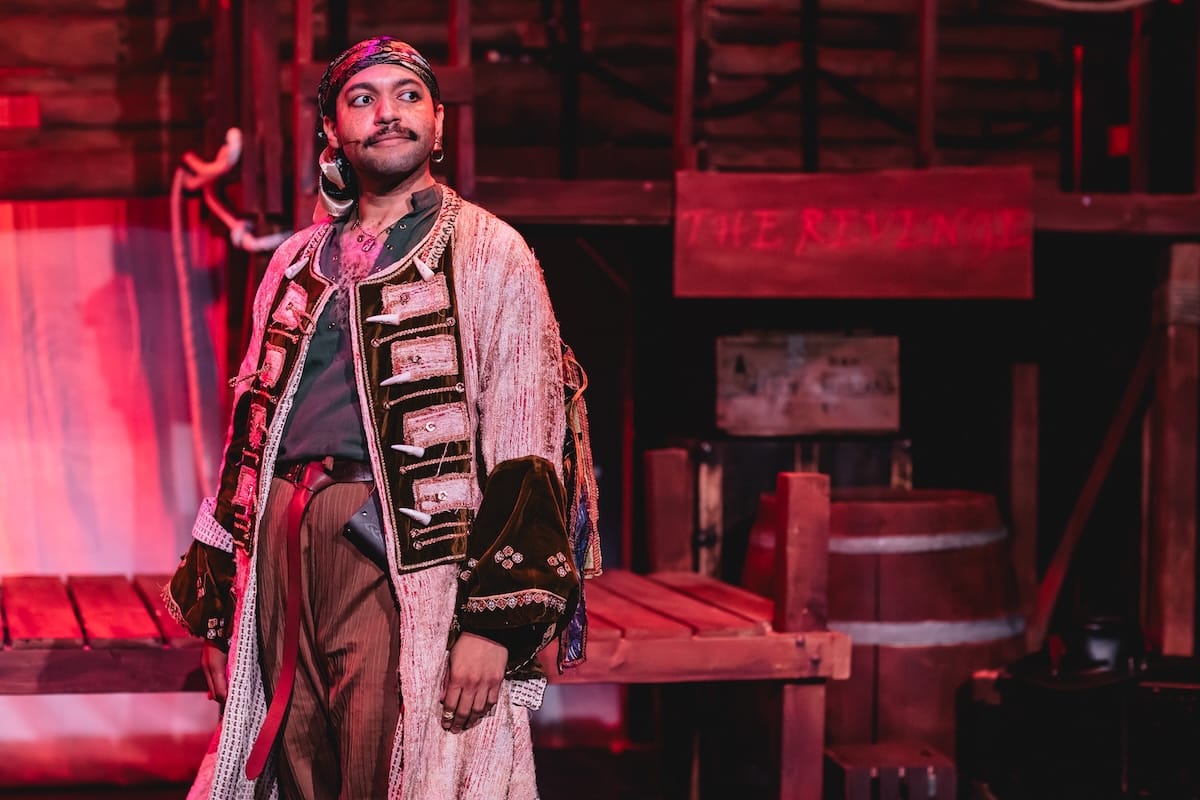 actors onstage in a play