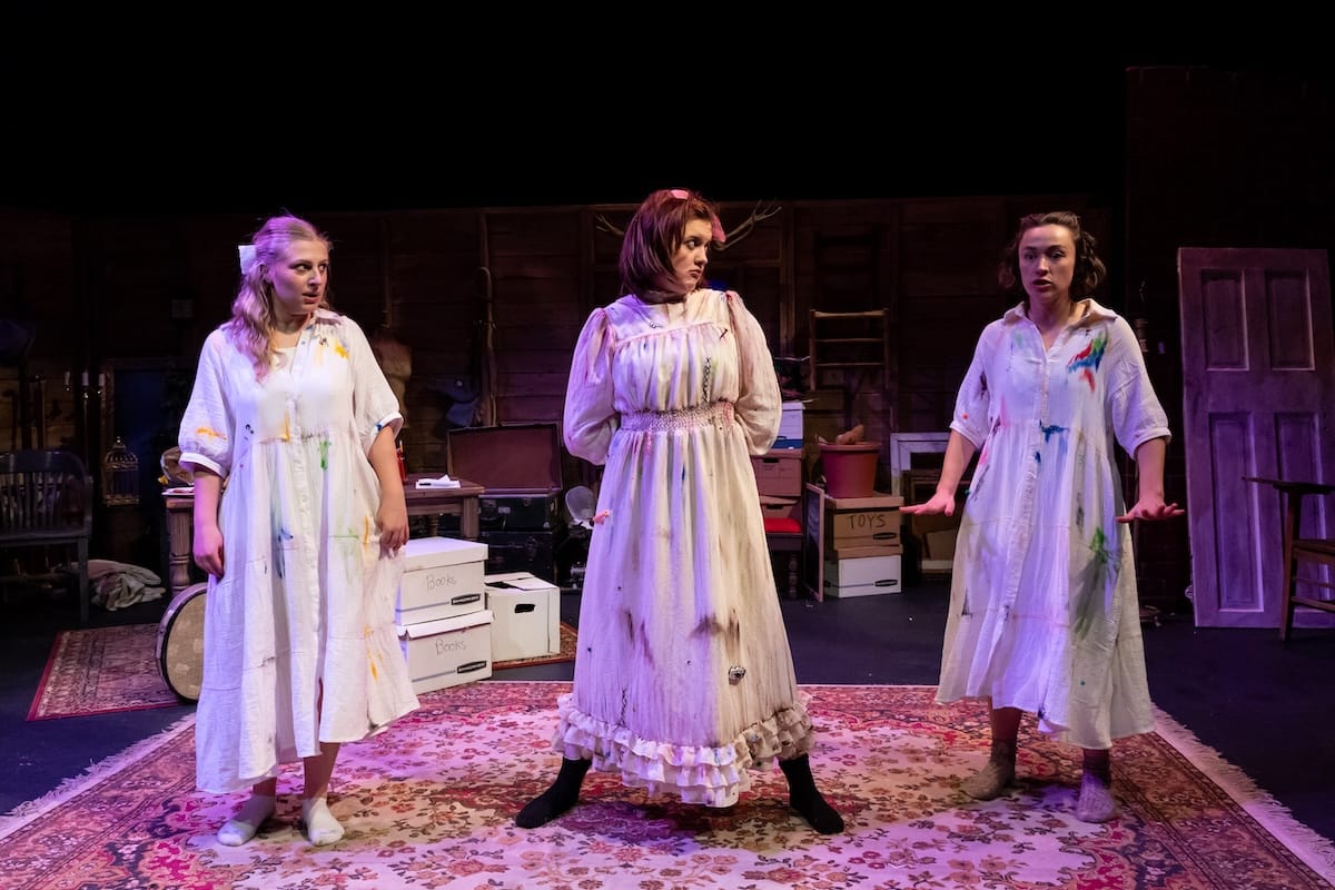 actors onstage in a play