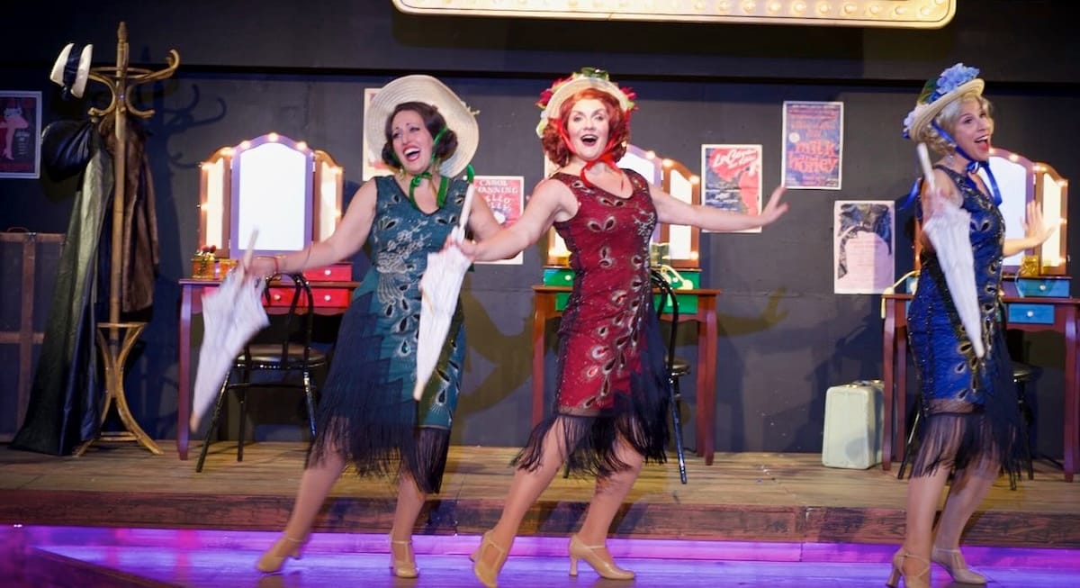 JerrysGirls actors onstage in a musical