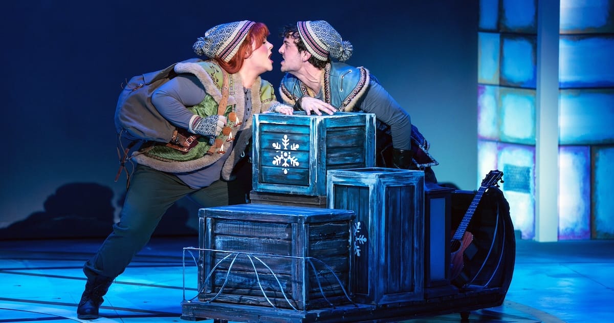 actors onstage in a musical