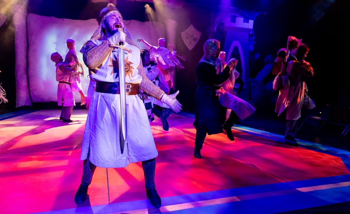 actor onstage in a musical