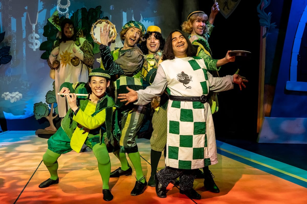 actors onstage in a musical