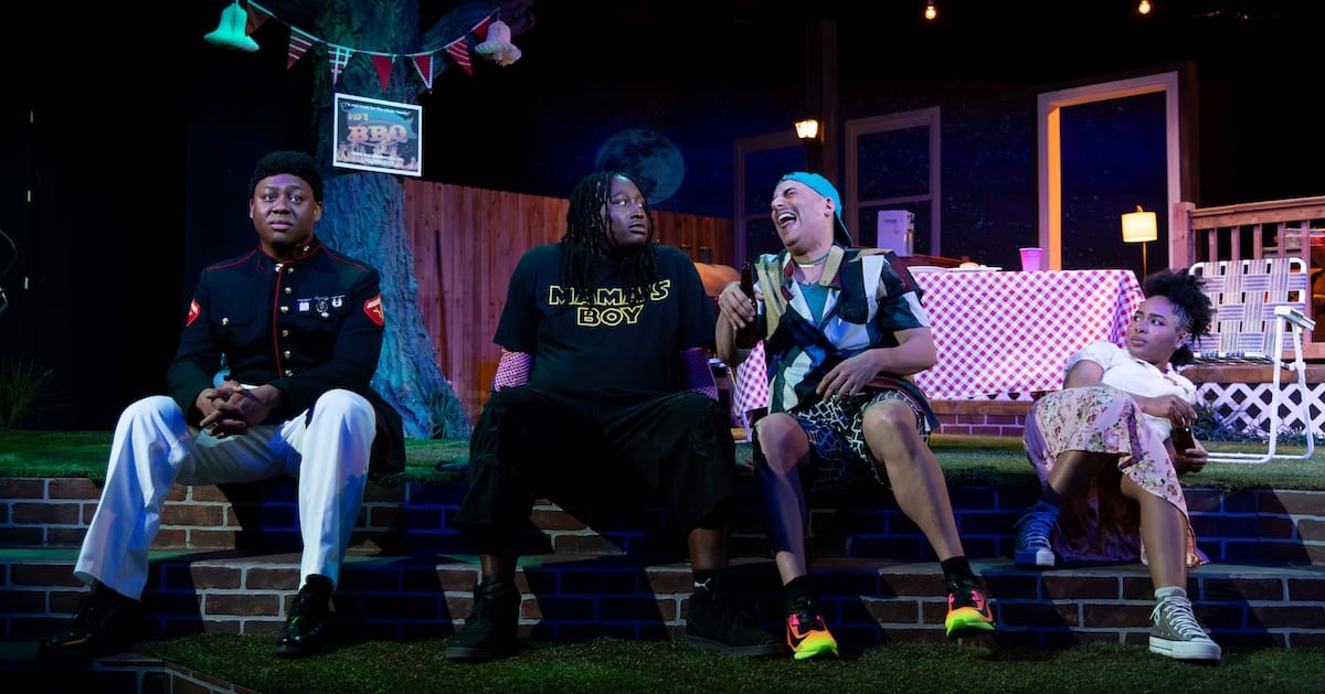 actors on stage in a play