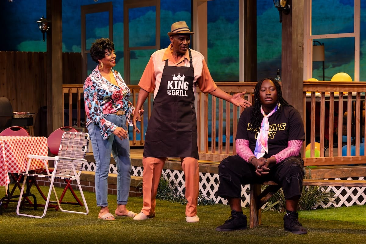 actors on stage in a play