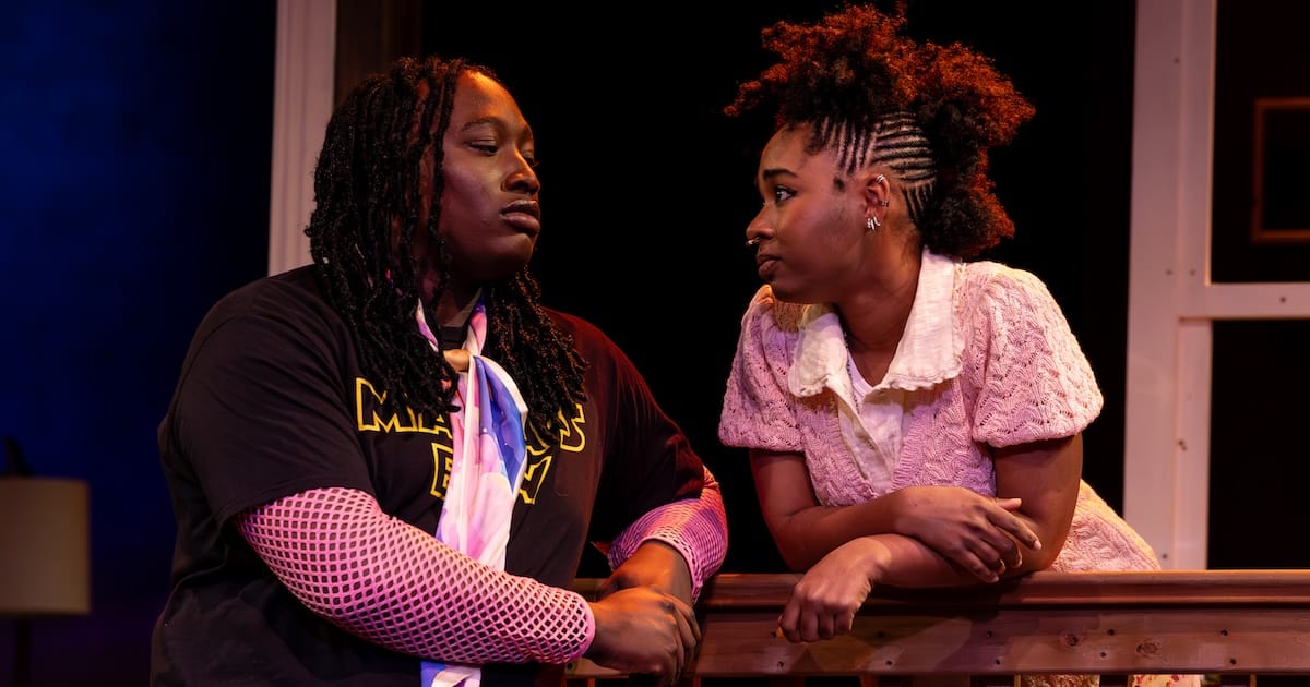 actors on stage in a play