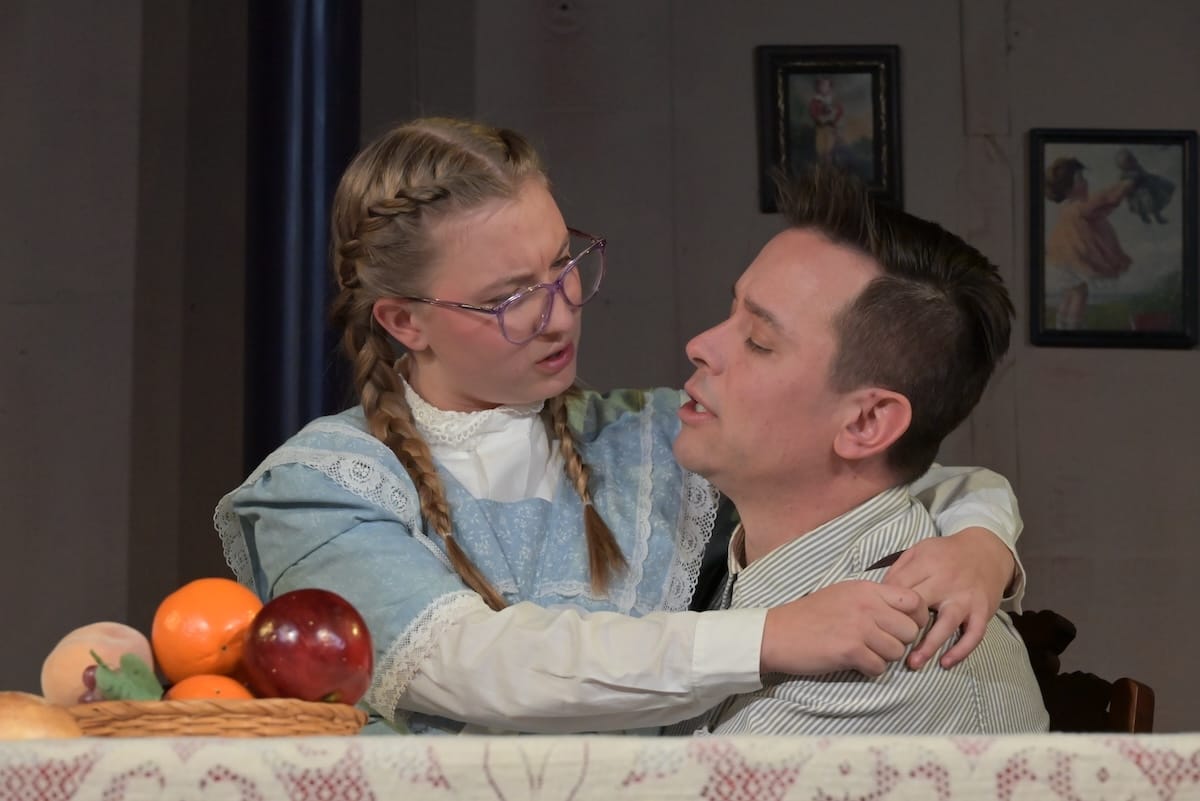 actors onstage in a play 