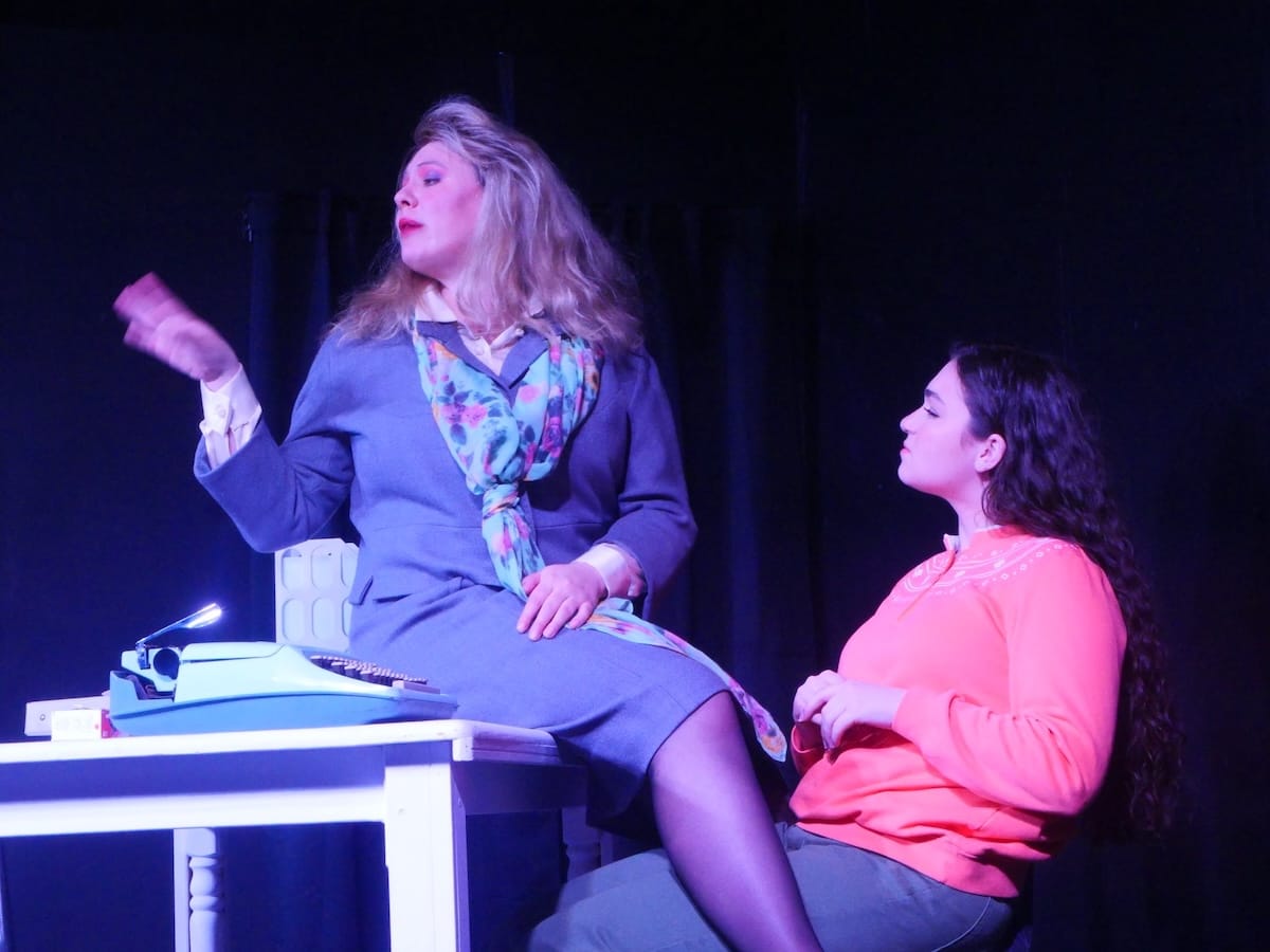 actors onstage in a play 