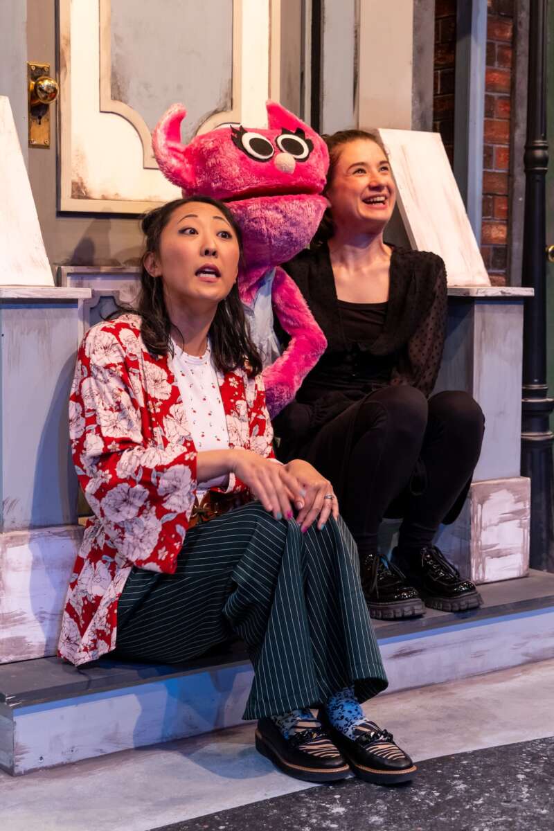actors onstage in a musical 