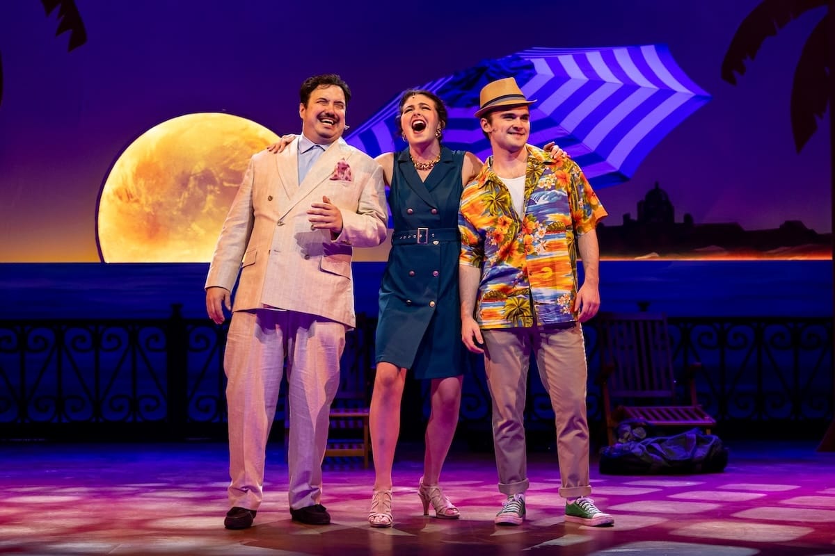 Three actors act in a musical