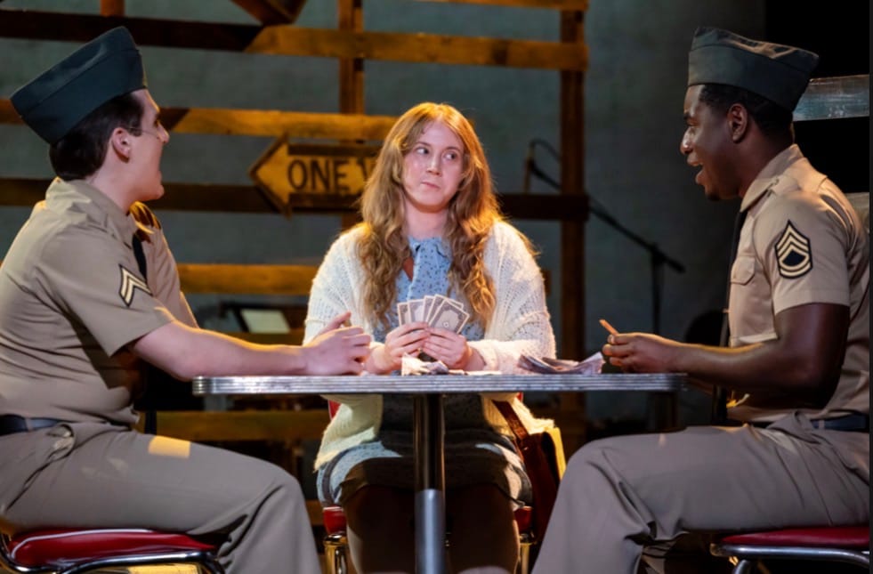 'Violet' is a well-produced staging of an odd musical 3 People playing cards together
