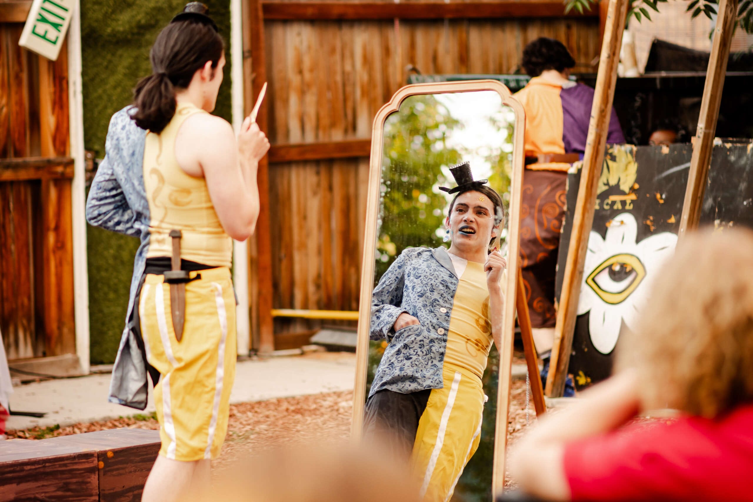 An actor performs outdoors