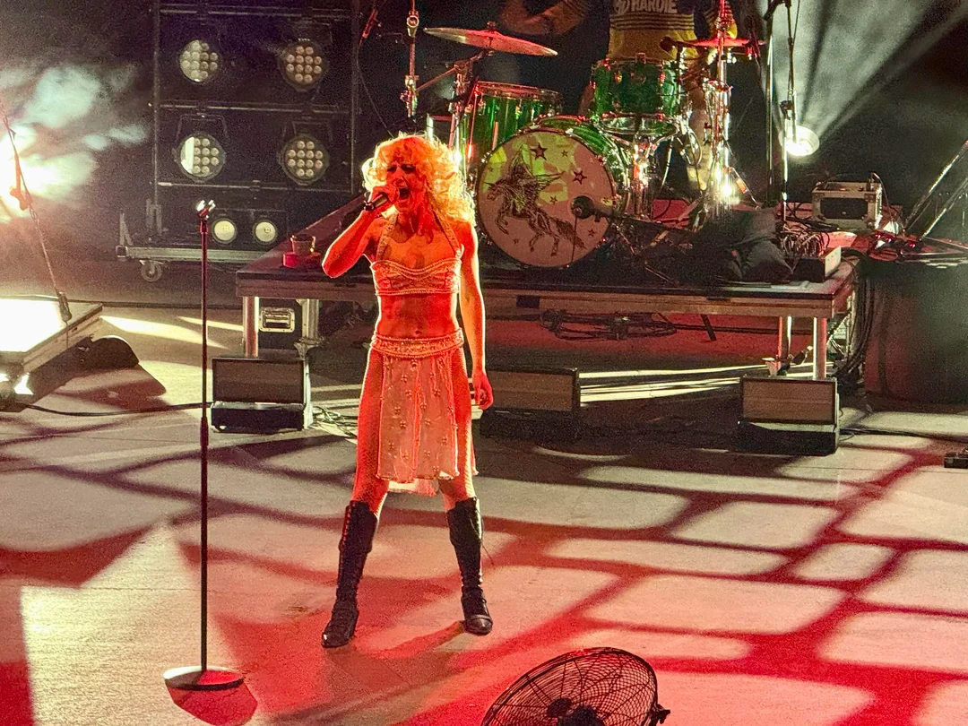 Woman sings onstage