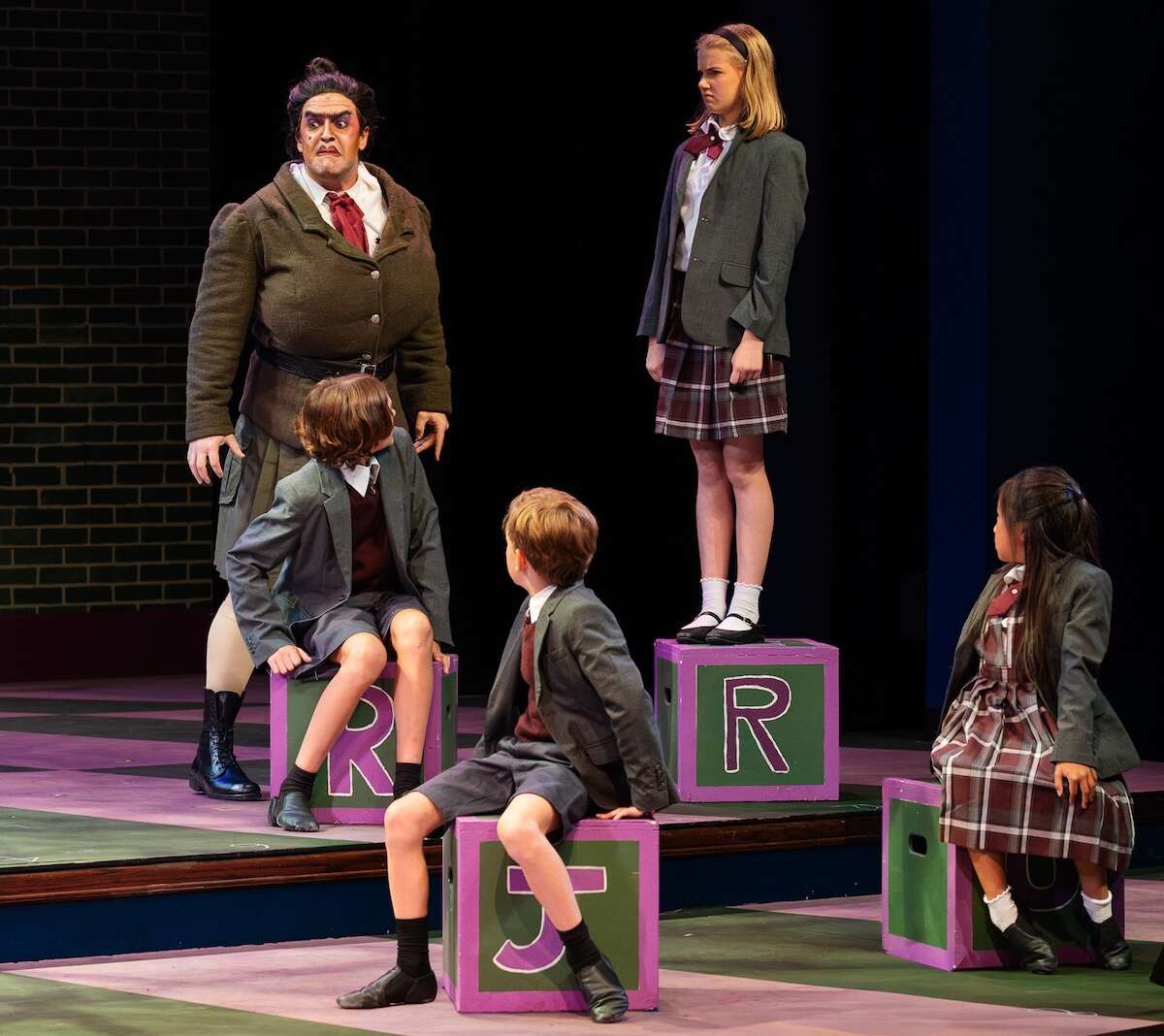 Candlelight’s ‘Matilda’ finds magic when it keeps things simple 2 A scary schoolmaster glares at children
