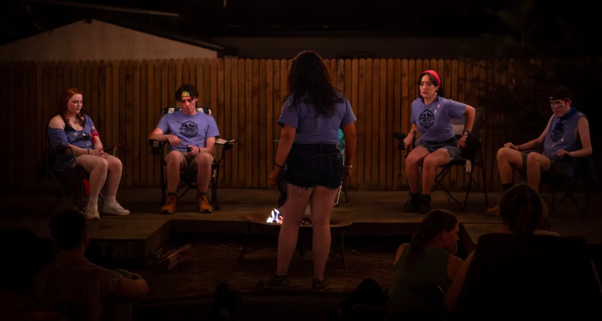 People around the campfire in The Grown-Ups
