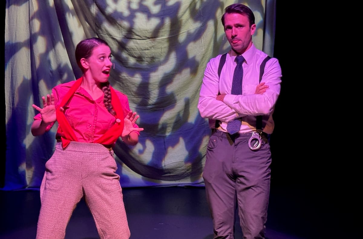 A brisk 'Murder for Two' could use more clarity 3 A woman pulls her suspenders as a man cross his arms in a scene from Murder for Two