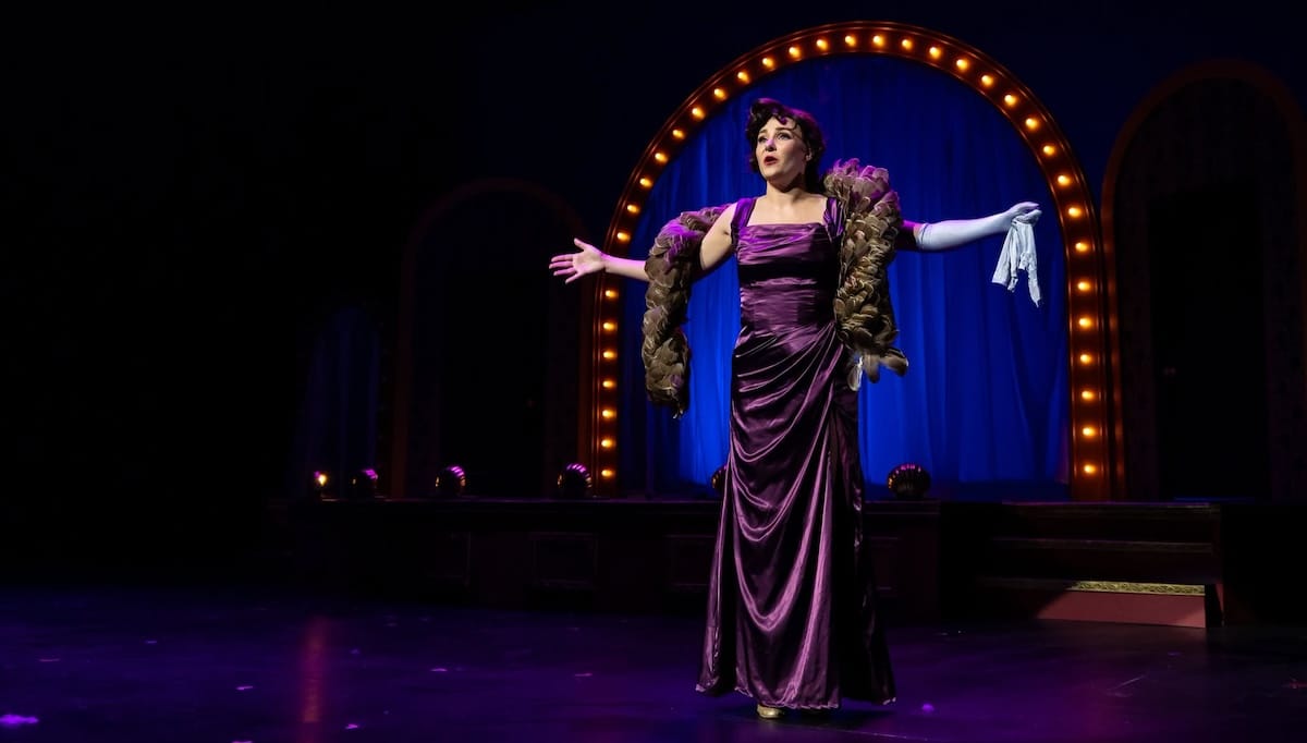 ‘Gypsy’ dazzles in the footlights, falters behind them 5 A woman signs onstage in