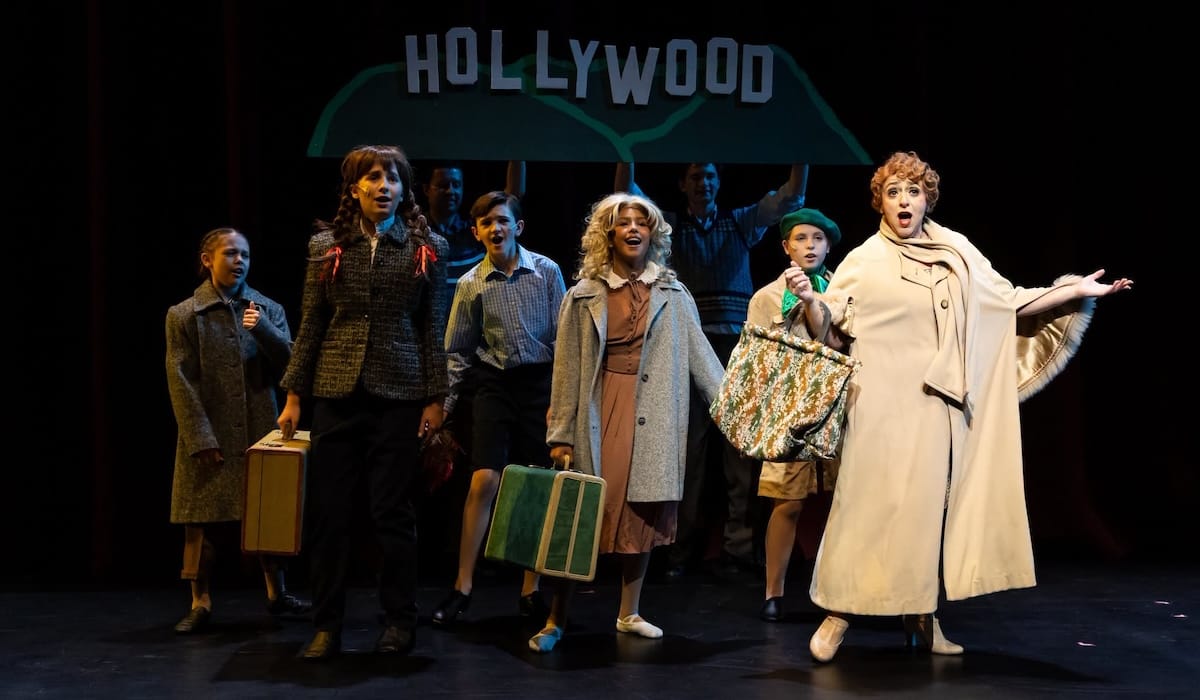 ‘Gypsy’ dazzles in the footlights, falters behind them 2 Actors sing in front of a Hollywood sign in