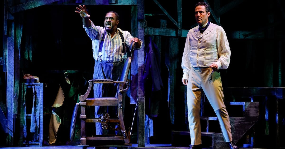 actors onstage in a musical