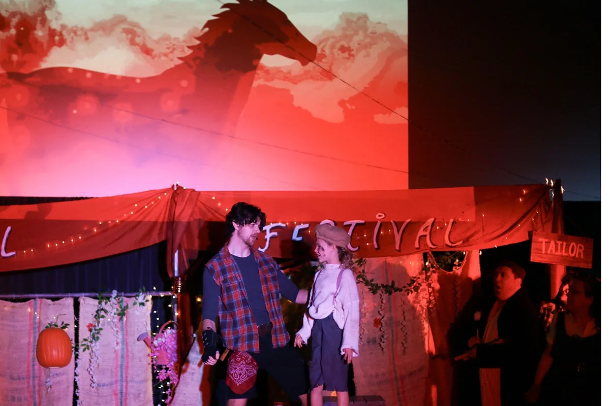 Actors perform a scene from 