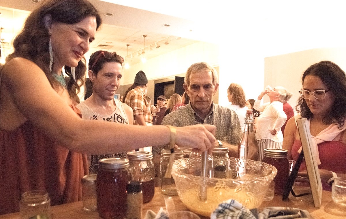 Can 'SIP' help reinvent immersive theatre in Colorado? 2 People gather around a bowl of liquid during a scene from
