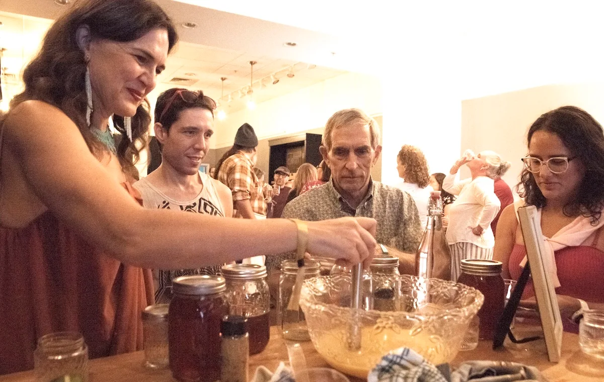 Can 'SIP' help reinvent immersive theatre in Colorado? 2 People gather around a bowl of liquid during a scene from
